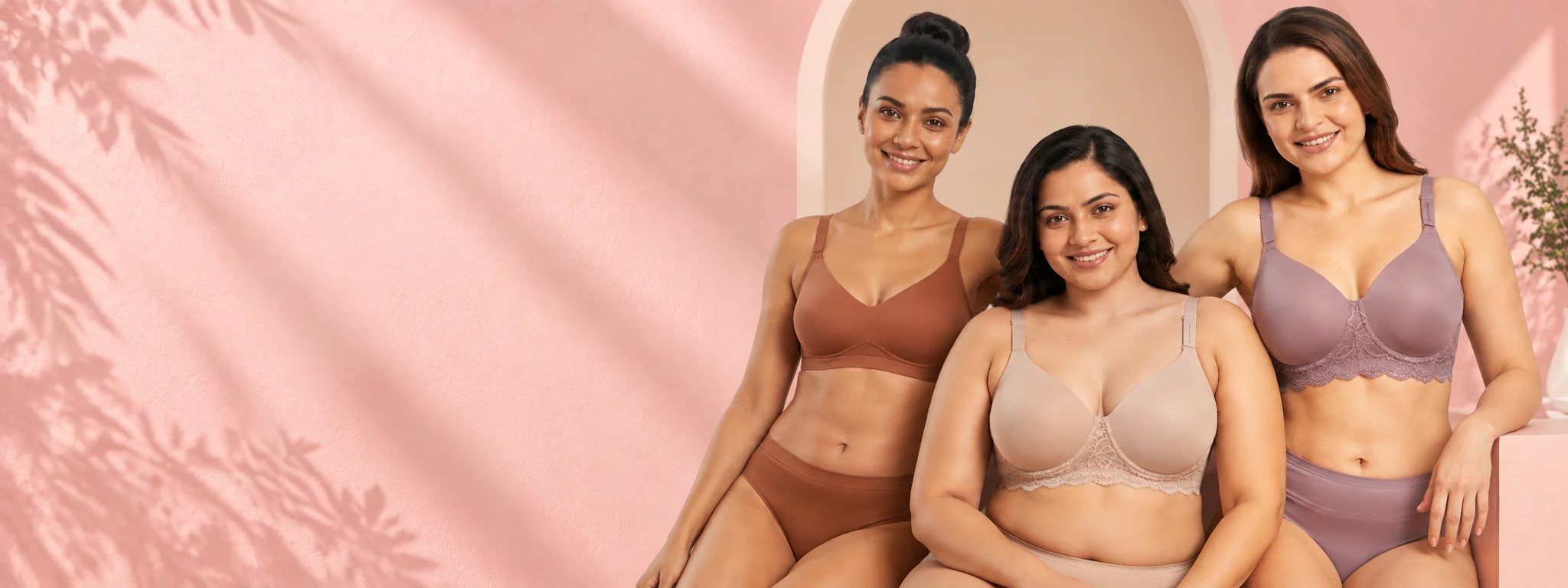 Three women modelling different comfortable bra styles for O’Womaniyah.